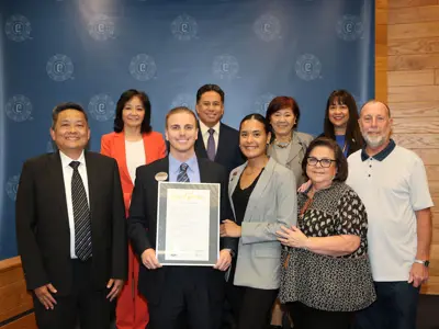 group photo of the Cerritos City Council with the operator of Chick-fil-A Cerritos