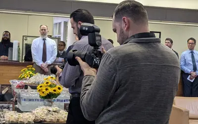 Person taking a photo with a camera