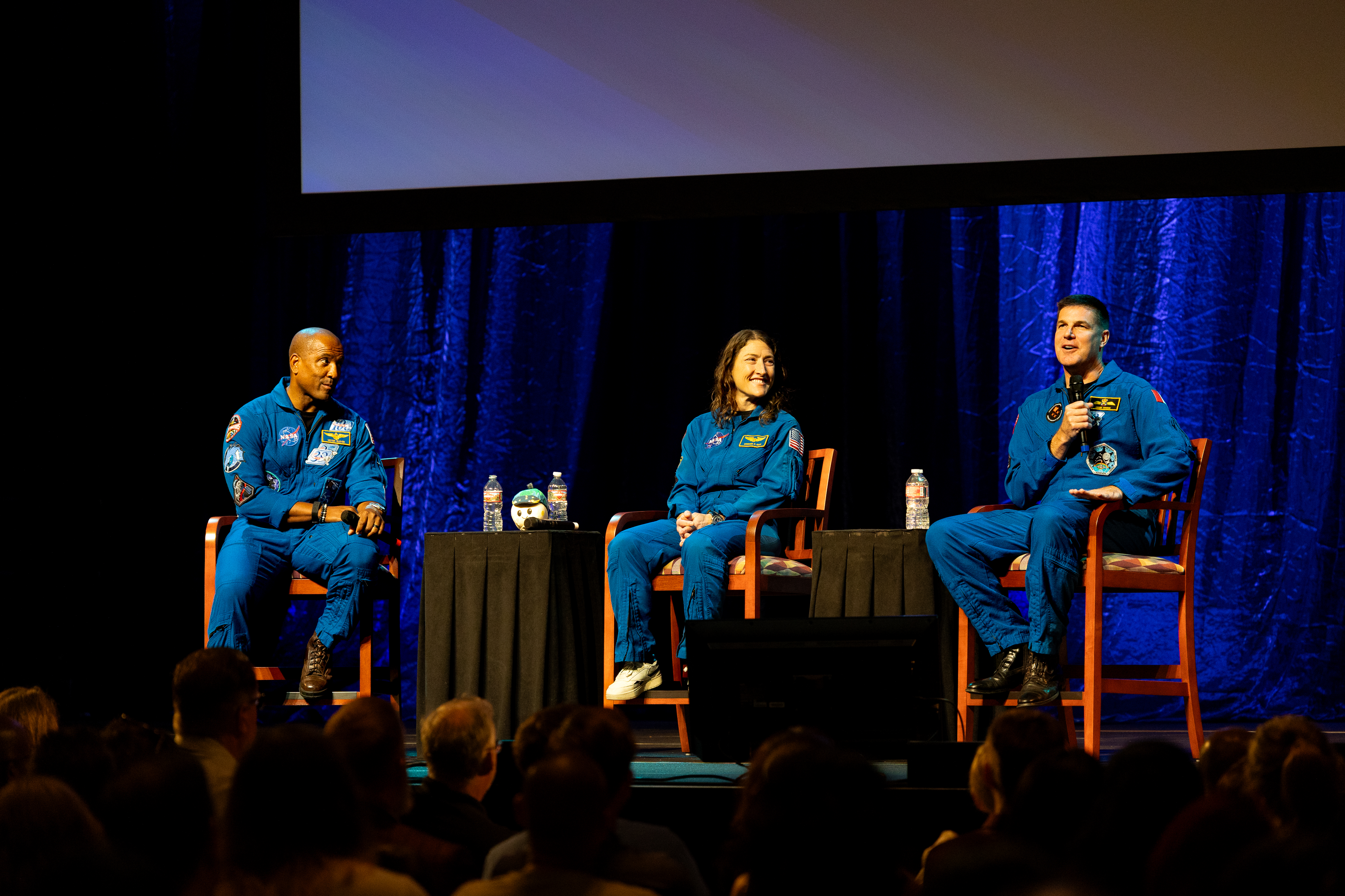 Artemis II astronauts on stage at the Cerritos Center for the Performing Arts on August 4, 2026